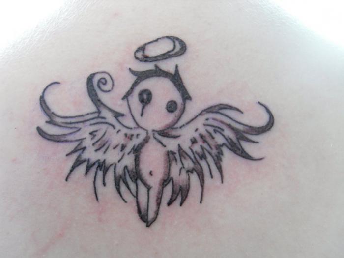 Ängeltatuering: innebörden av en tatuering. Angel Wings Tattoo